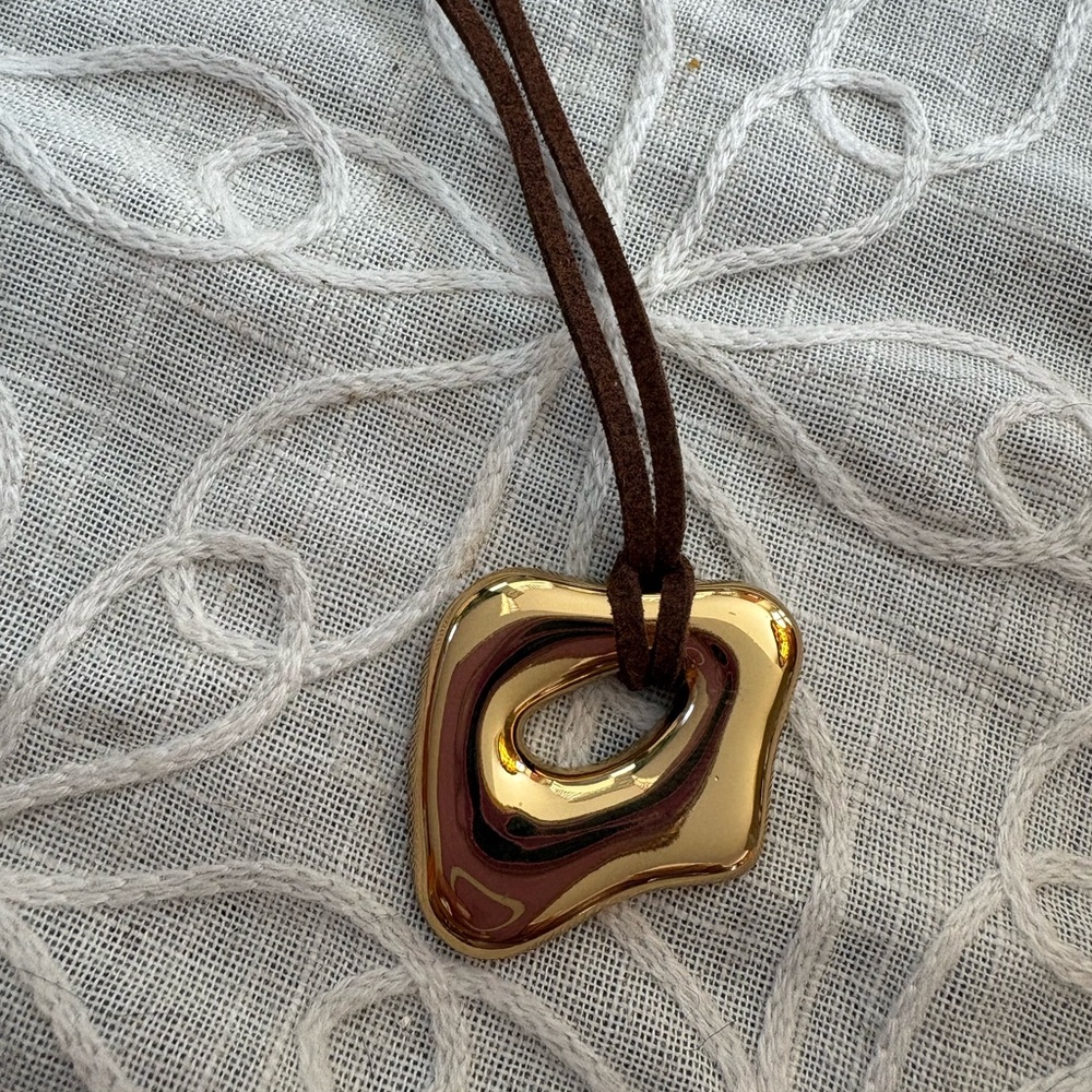 Elegant Gold Sculpture Long Pendant Necklace on Brown Cord - Picture 9 of 9
